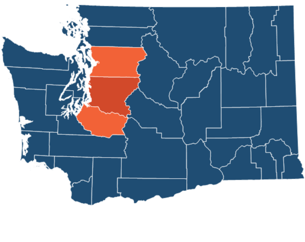 A blue silhouette of the state of Washington with the counties of [xyz] in orange.